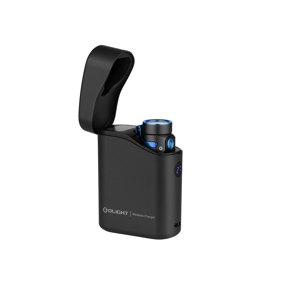 Olight Baton 4 Premium in black in its open charging case with digital display
