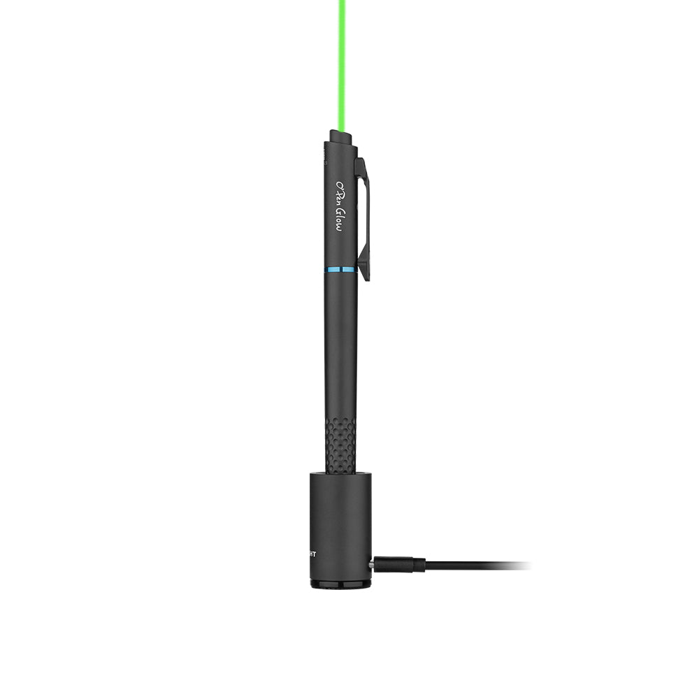 Olight O'Pen Glow penlight in black with green laser in its charging base